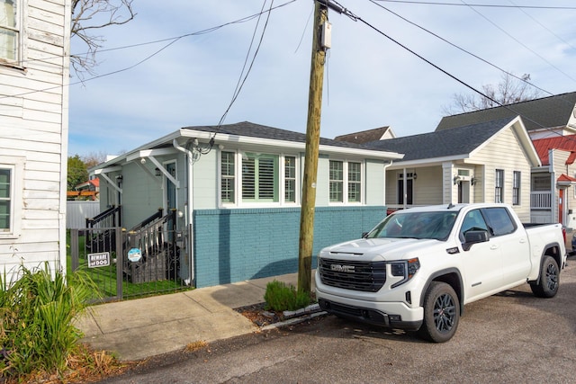 view of front of home with brick siding