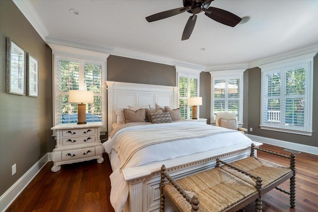 bedroom with ceiling fan, dark wood-type flooring, and ornamental molding