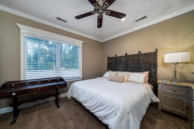 carpeted bedroom featuring ceiling fan and ornamental molding