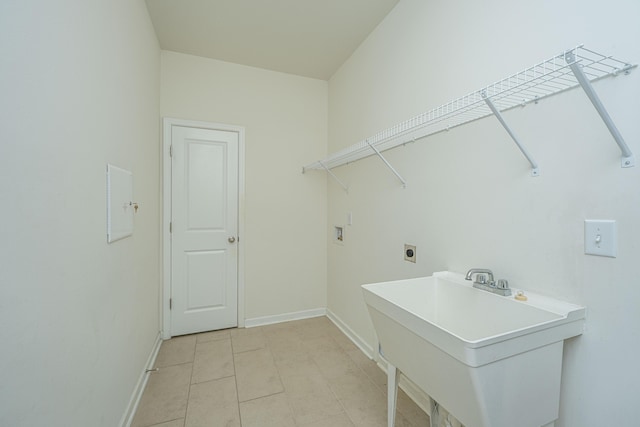 laundry room featuring washer hookup, sink, and hookup for an electric dryer