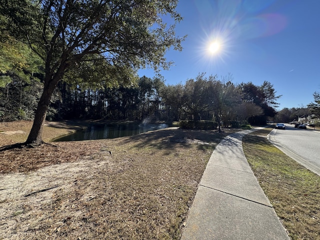 view of road featuring a water view