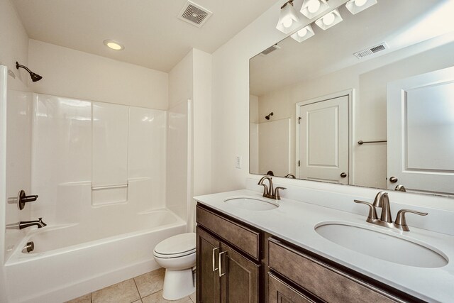 full bathroom with tile patterned flooring, vanity, toilet, and shower / bath combination