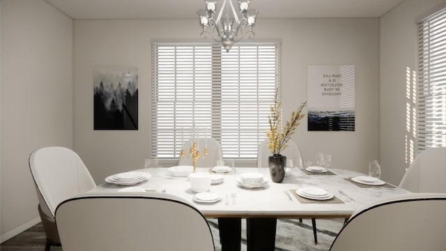 dining area featuring a chandelier