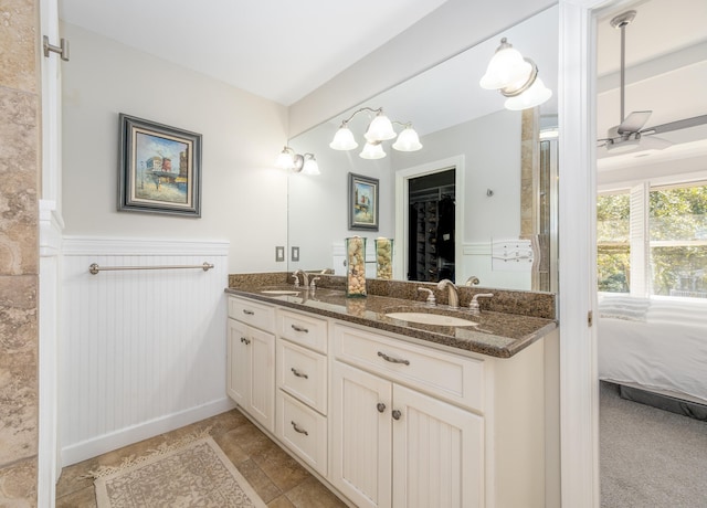 bathroom with vanity and ceiling fan