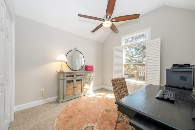 carpeted office featuring ceiling fan and lofted ceiling