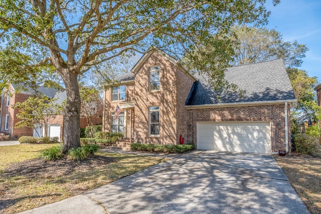 view of front of property with a garage