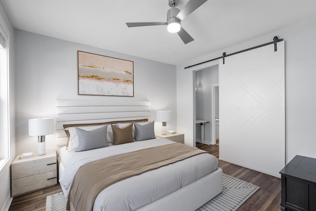 130 River Landing Dr Unit 4102, Charleston, SC 29492 - bedroom featuring a barn door, dark wood-style flooring, and ceiling fan