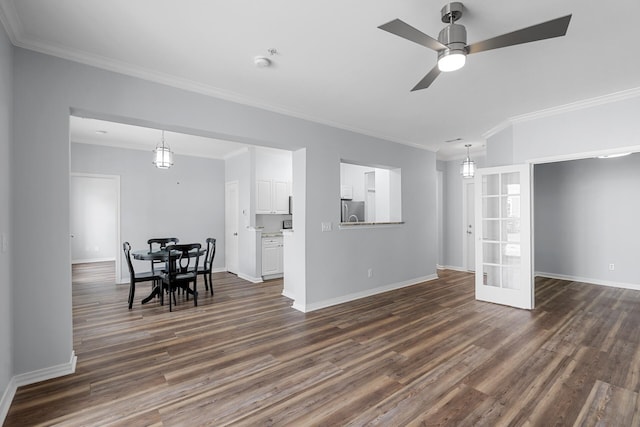 130 River Landing Dr Unit 4102, Charleston, SC 29492 - living area with dark wood finished floors, crown molding, baseboards, and a ceiling fan