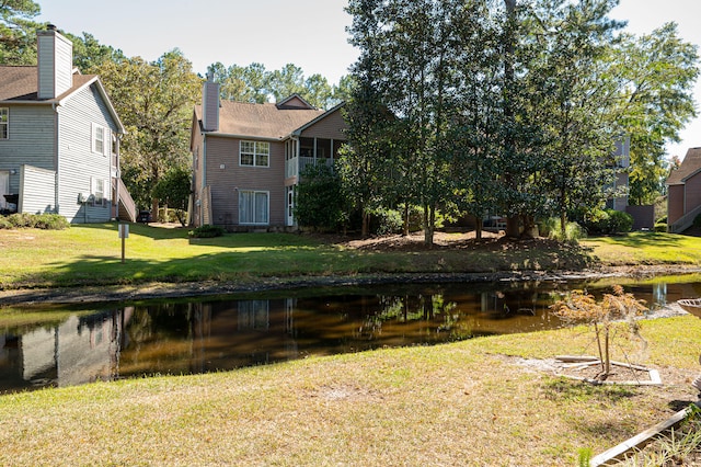 exterior space featuring a water view