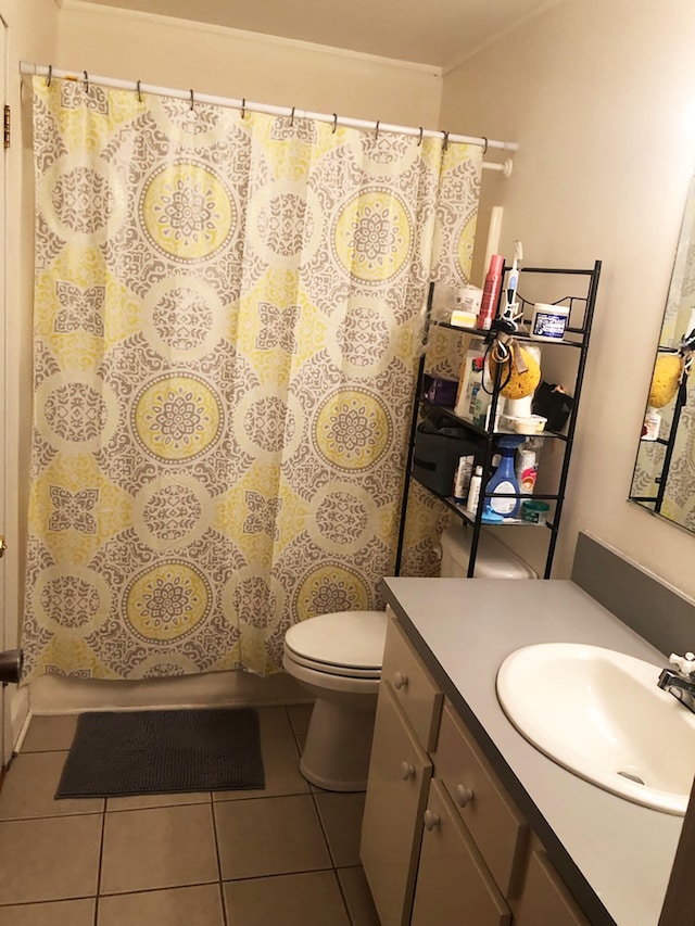 full bathroom featuring vanity, toilet, shower / bath combo, and tile patterned flooring