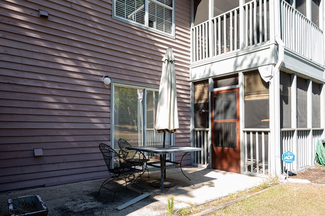 exterior space featuring a balcony