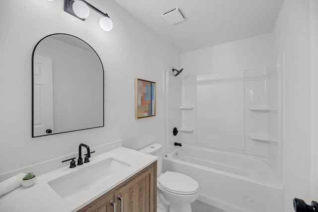 bathroom with toilet, vanity, and shower / bathing tub combination