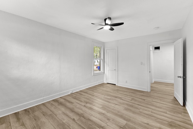 interior space with ceiling fan and light hardwood / wood-style flooring