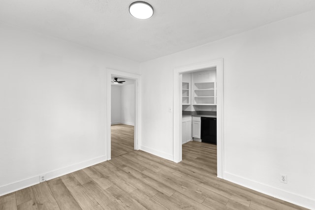 spare room with light wood-type flooring