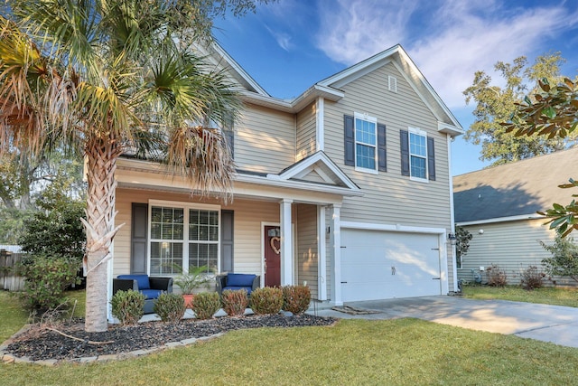 view of front facade featuring a garage, a porch, and a front yard