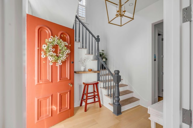 entrance foyer with hardwood / wood-style floors