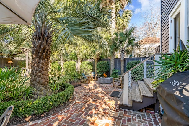 view of patio with a grill