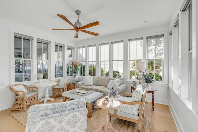 sunroom / solarium with ceiling fan