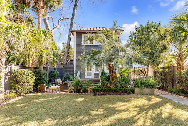 view of front facade with a front yard