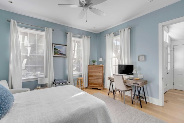 bedroom featuring ceiling fan and light wood-type flooring