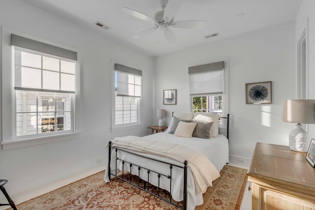 bedroom featuring ceiling fan and wood-type flooring