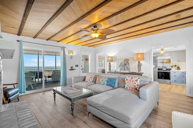 living room featuring ceiling fan, wood ceiling, light hardwood / wood-style floors, and beamed ceiling