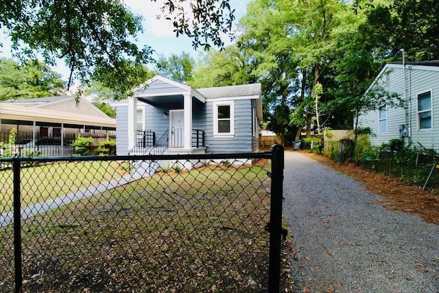 bungalow with a front lawn