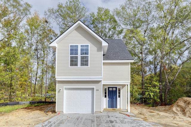 view of property featuring a garage