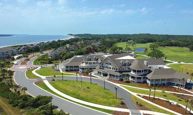 bird's eye view with a water view and golf course view