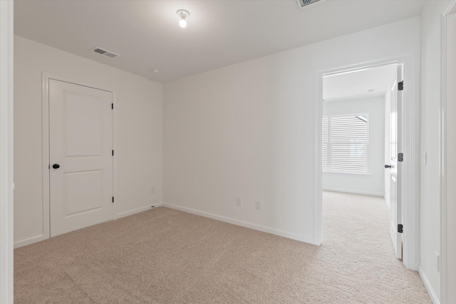 351 Blue Oak Dr, Moncks Corner, SC 29461 - spare room featuring light carpet and baseboards