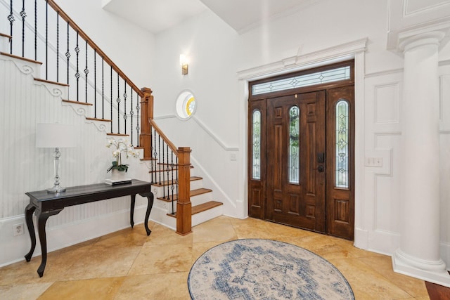 3 Cross Ln, Isle Of Palms, SC 29451 - foyer entrance with stairs, decorative columns, and baseboards