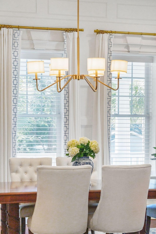 3 Cross Ln, Isle Of Palms, SC 29451 - dining room with a chandelier and healthy amount of natural light