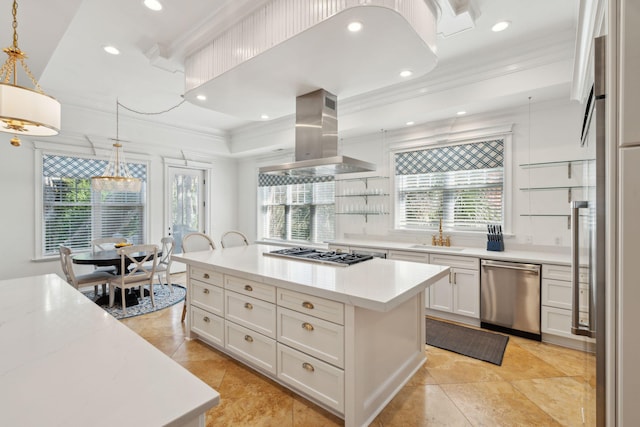 3 Cross Ln, Isle Of Palms, SC 29451 - kitchen with appliances with stainless steel finishes, island range hood, ornamental molding, a center island, and plenty of natural light