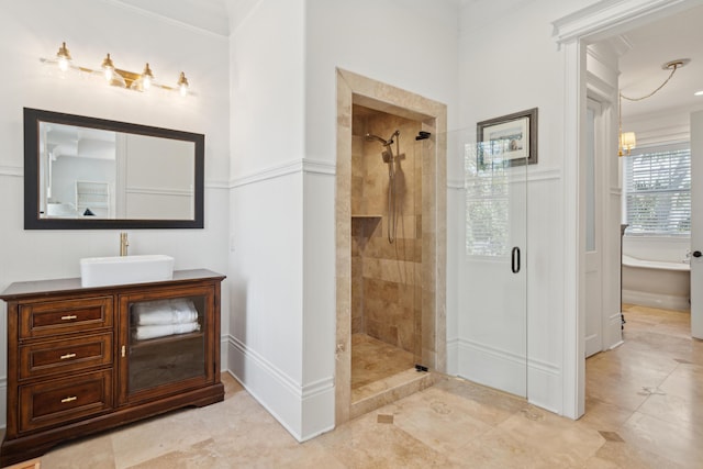 3 Cross Ln, Isle Of Palms, SC 29451 - bathroom featuring a stall shower, vanity, baseboards, tile patterned floors, and crown molding