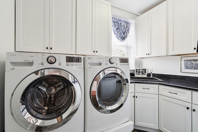 3 Cross Ln, Isle Of Palms, SC 29451 - laundry room featuring independent washer and dryer and cabinet space