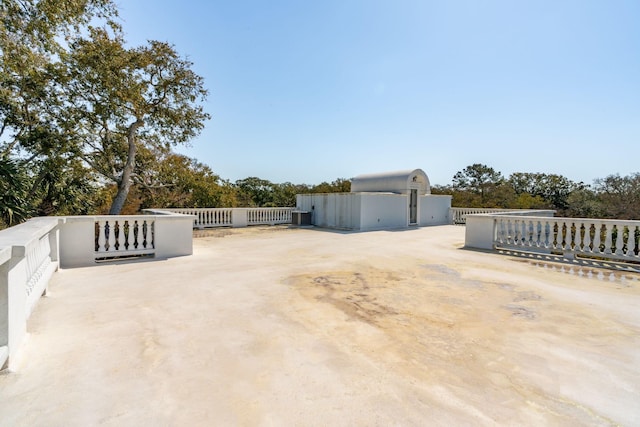 3 Cross Ln, Isle Of Palms, SC 29451 - exterior space with stucco siding and view of scattered trees