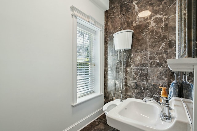 3 Cross Ln, Isle Of Palms, SC 29451 - bathroom featuring baseboards, toilet, a sink, and marble finish flooring