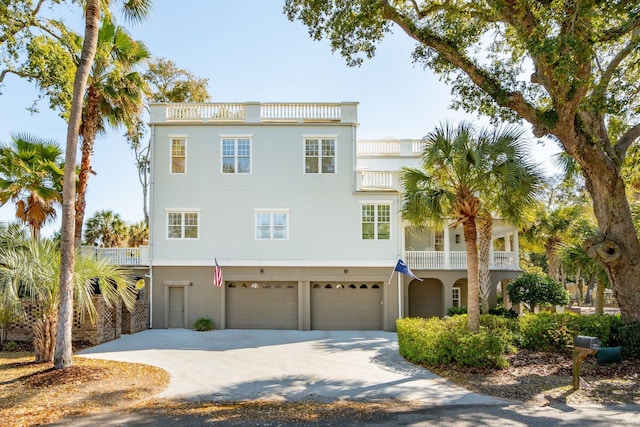 3 Cross Ln, Isle Of Palms, SC 29451 - view of front facade featuring a garage and driveway
