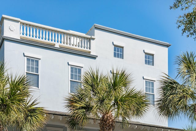 3 Cross Ln, Isle Of Palms, SC 29451 - view of side of property featuring a balcony and stucco siding