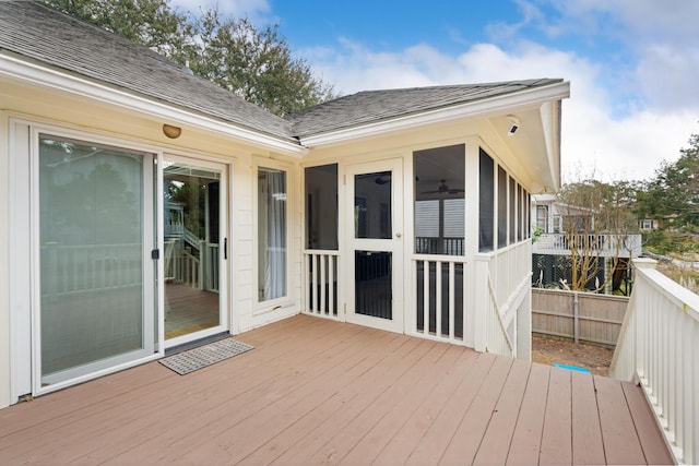 wooden terrace with a sunroom