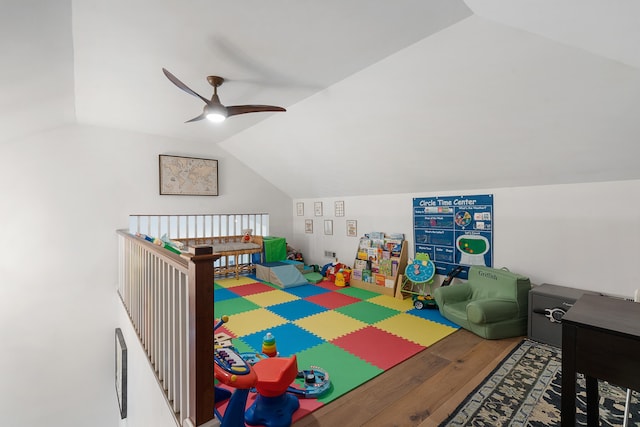 game room featuring lofted ceiling, hardwood / wood-style floors, and ceiling fan