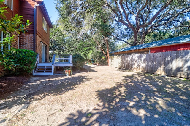 view of yard with a deck