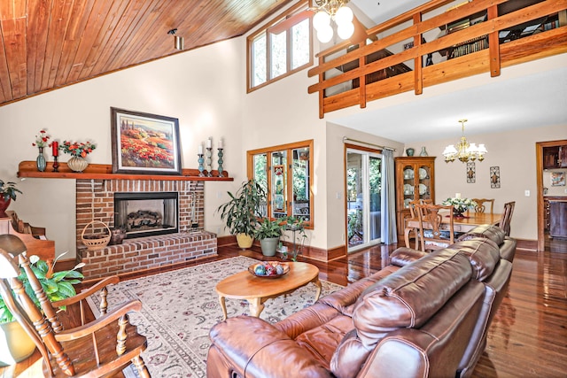 living room featuring high vaulted ceiling, wood-type flooring, a fireplace, and wooden ceiling