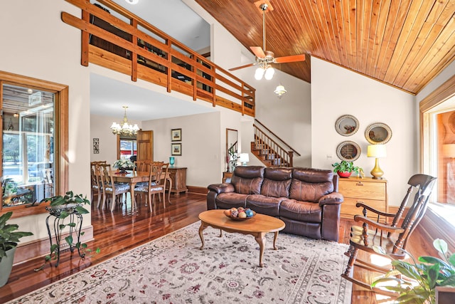 living room with high vaulted ceiling, wood ceiling, and ceiling fan with notable chandelier