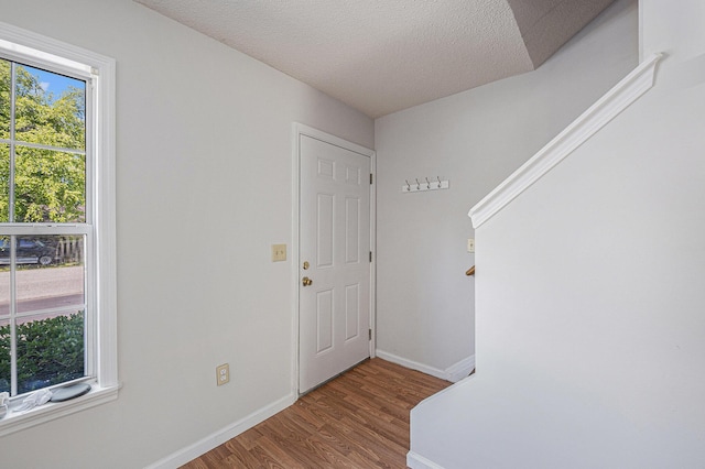 111 Elmwood Ave Unit A, Ladson, SC 29456 - entrance foyer featuring wood finished floors, baseboards, and a textured ceiling