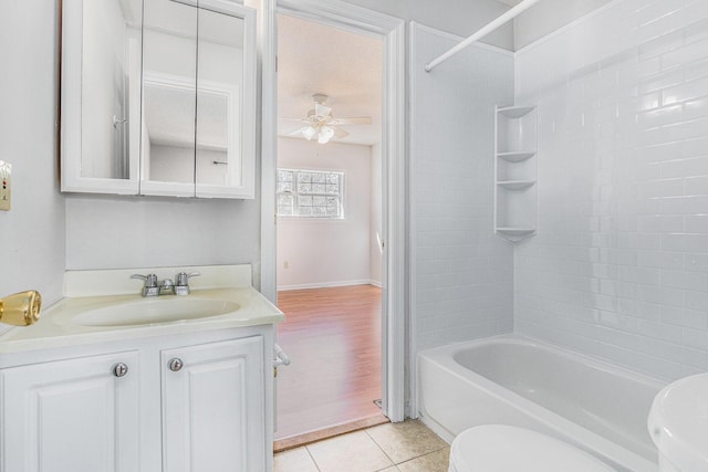 111 Elmwood Ave Unit A, Ladson, SC 29456 - bathroom with toilet, vanity, tile patterned flooring, ceiling fan, and bathtub / shower combination