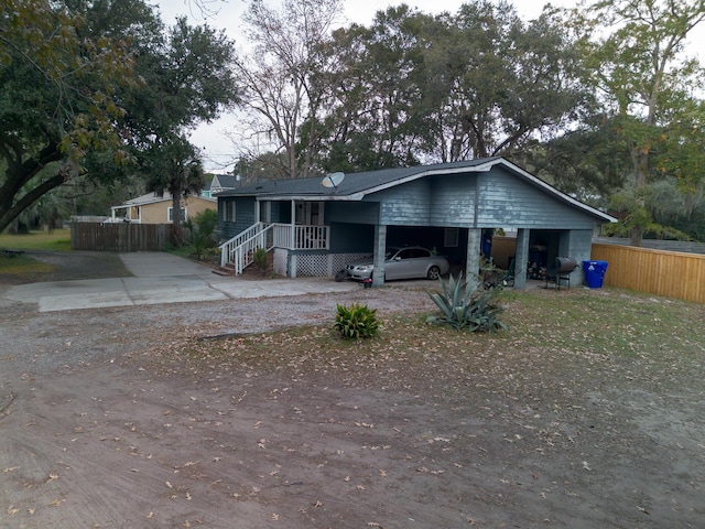 view of front of property with a carport