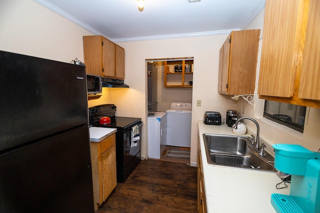 kitchen featuring sink, dark wood-type flooring, washing machine and dryer, black appliances, and ornamental molding