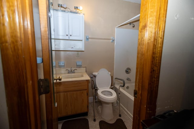 full bathroom featuring toilet, vanity, and tub / shower combination