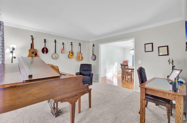 game room featuring light carpet and ornamental molding